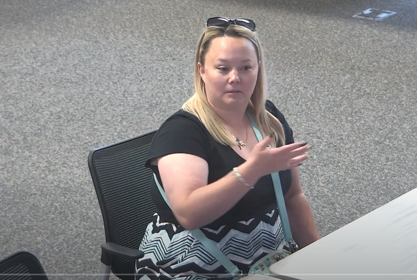 Katherine Cheek, the parent of a Flagler Palm Coast High School student, urges the School Board to install weapons detectors at a Sept. 23 workshop. Image from Flagler Schools video