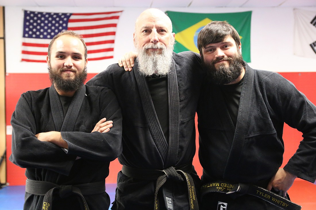 Stan Lee's United Martial Arts instructor Peyton Raymond, founder Stan Lee and chief instructor Tyler Whitby. Photo by Jarleene Almenas