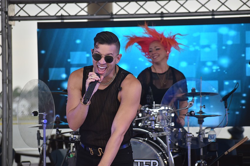 Singer songwriter Chaz Robinson and drummer Natalie Mustang perform as part of the band No Filter.