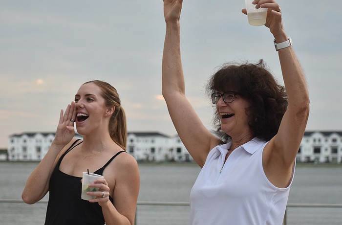 Lakewood Ranch's Payton Marshall, along with her mother-in-law Marie Marshall, cheer on No Filter. The band played at her wedding on June 22, 2024.