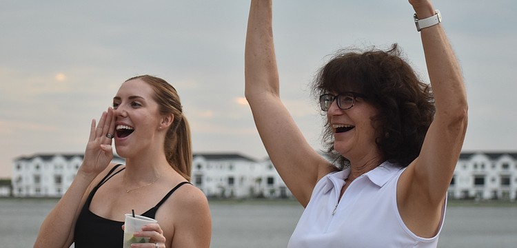 Lakewood Ranch's Payton Marshall, along with her mother-in-law Marie Marshall, cheer on No Filter. The band played at her wedding on June 22, 2024.