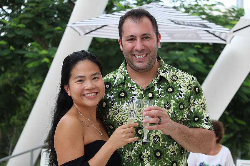 Jenny Nguyen and Ian Stewart cheers to the third anniversary of The Bay, celebrated with music, dancing and champagne on Oct. 1.