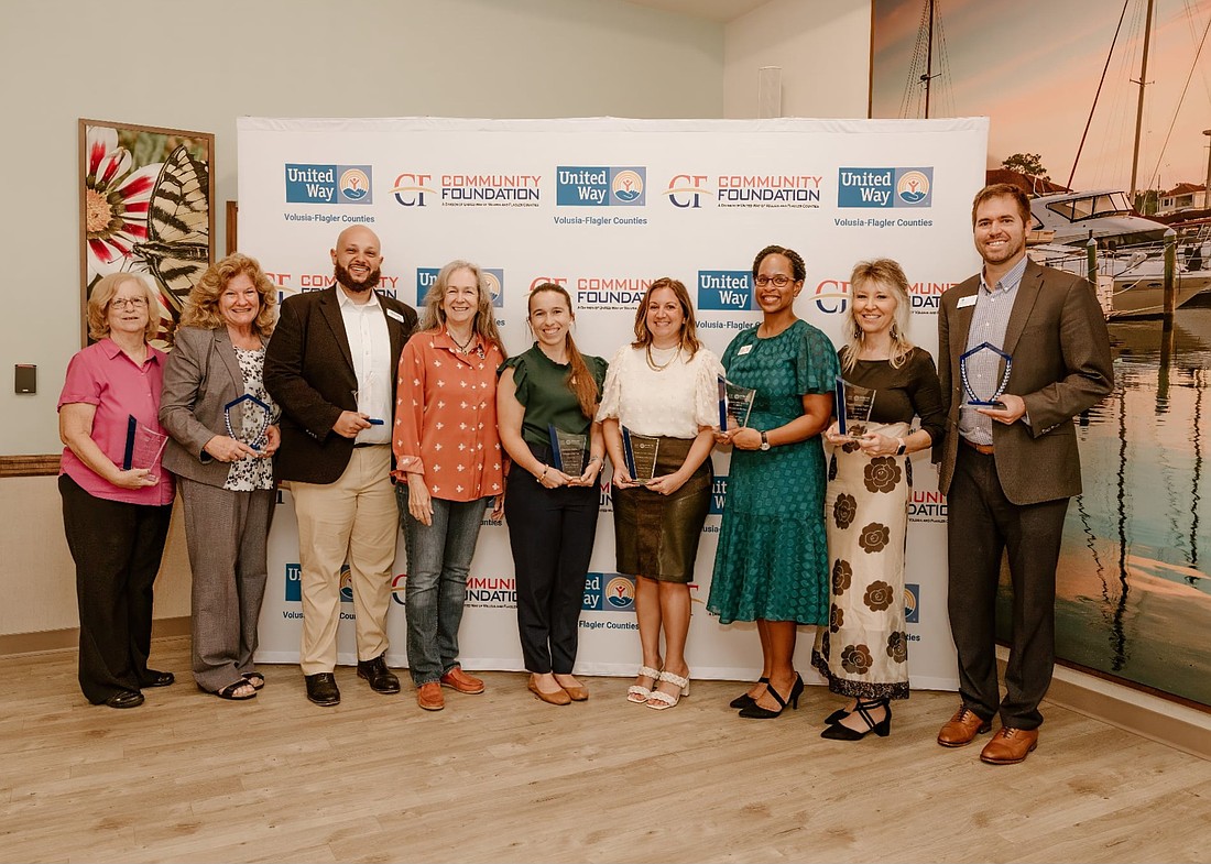The 2025 Annual Impact Celebration Honorees: Michelle Bennett, VITA Volunteer of the Year; Karen Jacobs, Board Member of the Year; Emmanuel Kamel, CF/UWVFC Staff Member of the Year; Robin King, Impact Circle Pinning Honoree; Teresa Wiggins, 2024–2025 Generation IMPACT Volunteer of the Year; Stephanie Renick, Women United - Volusia Volunteer of the Year; Stephanie Parks, Community Impact Cabinet Volunteer of the Year; Cindy Dalecki Morrissey, Women United - Flagler Volunteer of the Year; and Ryan Page, President & CEO, Intracoastal Bank, President’s Award Honoree. Courtesy photo