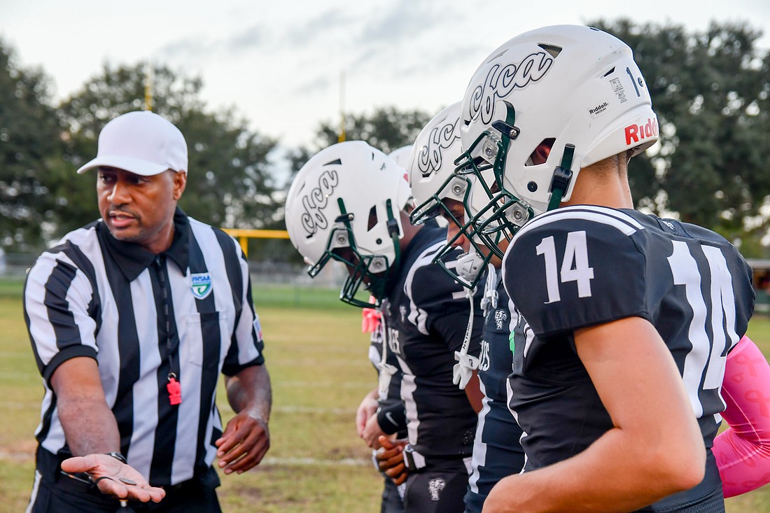CFCA's captains listened to the referee and waited for the coin toss.