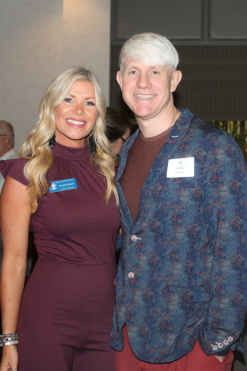 Hosted by Krystel Beall, the first annual Pathways to Resilience Lunch and Learn educational and benefit event supports Resilient Retreat's mission of helping trauma patients heal. Krystel is photographed with her husband, Matt Beall.