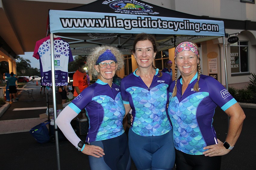 Village Idiots Cycling Club Board Members Meredith Smith, Dawn Zielinski and Ann Drummond prepare for the Women on Wheels Ride Oct. 5 in Lakewood Ranch.