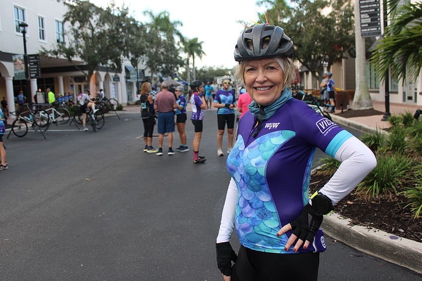 Kris Woodcock of the St. Petersburg Bicycle Club shows off the jersey presented to participants at the Women on Wheels Ride in Lakewood Ranch.