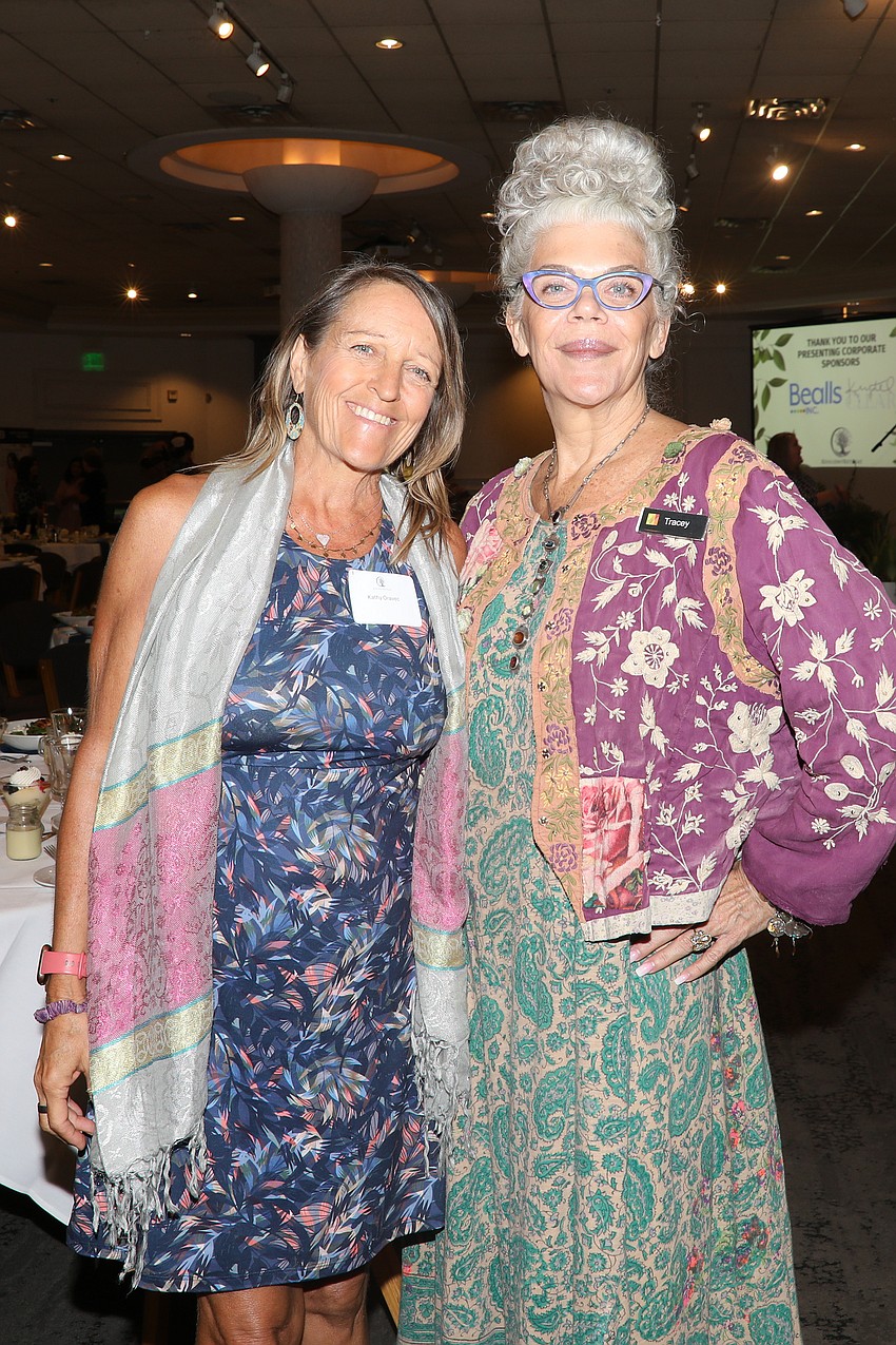 Kathy Oravec teaches a Mindful Movement class at Resilient Retreat and is photographed with Michael's on East catering manager Tracey McCammack.