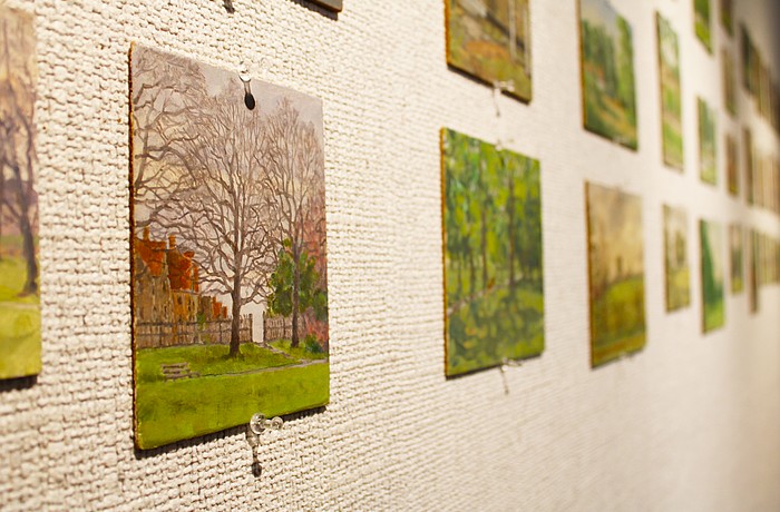 Oil painter Allan G. Cumming uses short brush strokes to enliven the trees in his miniature paintings.