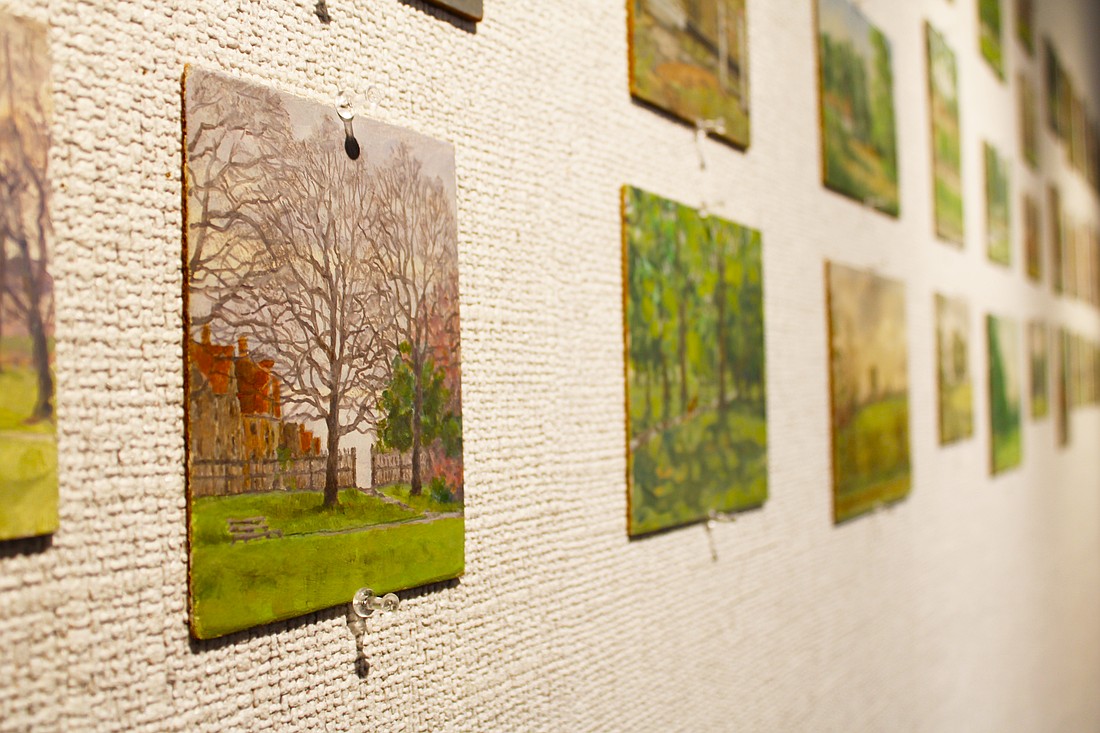 Oil painter Allan G. Cumming uses short brush strokes to enliven the trees in his miniature paintings.