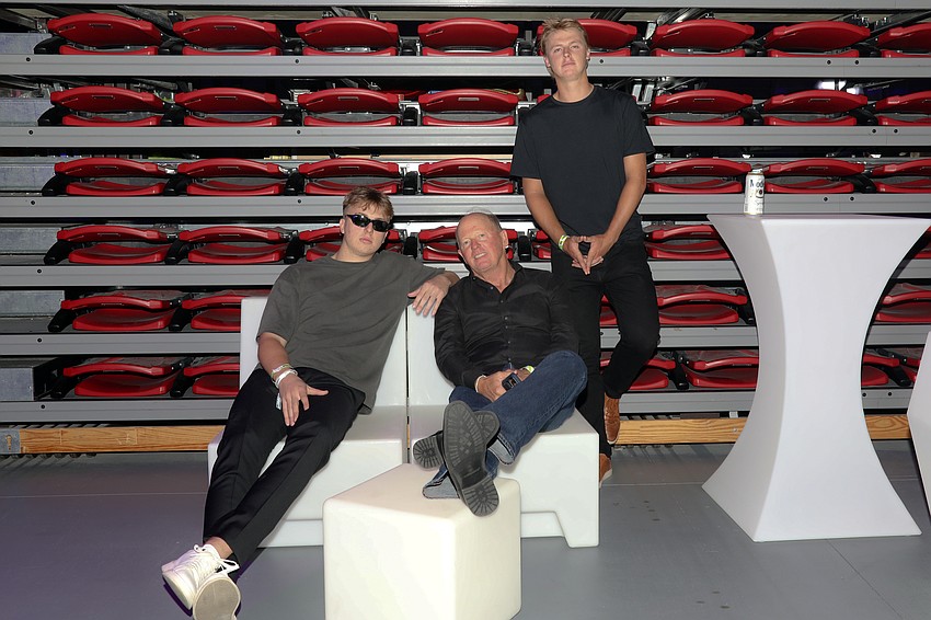 It's a family affair: brothers Jake and Max Pettingell with dad, Roger Pettingell (center).