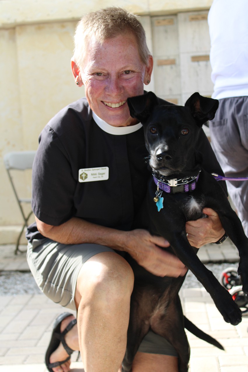 Rev. Nikki Seger brought her own dog, Bishop, to St. Boniface Episcopal Church's annual pet blessing on Oct. 4.
