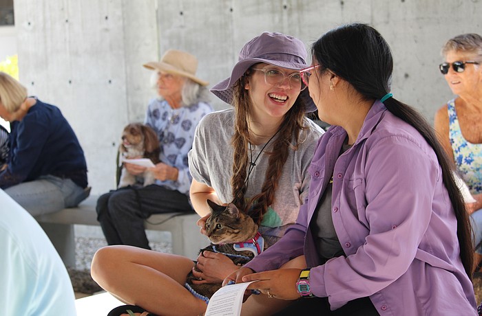 Talia Casey and Alex Perez brought their cat, Mister Figment Spirit Wink, to the Oct. 4 pet blessing at St. Boniface Episcopal Church.
