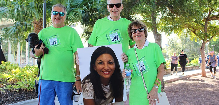Mike Wagner, Andy Demartini and Gretchen Demartini walked at the 5th annual NAMIWalks Sarasota and Manatee fundraiser on Oct. 4 at Payne Park in memory of Jennifer Demartini.