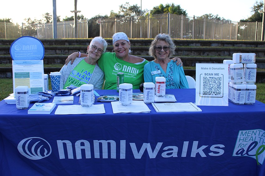 Volunteers Lynn Lafferty, Kimbal Grassia and Ellen Wilson share information about the mental health services available through NAMI Sarasota and Manatee Counties.