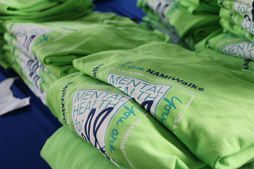 NAMIWalks participants who raised more than $100 to support free mental health services received a commemorative T-shirt.
