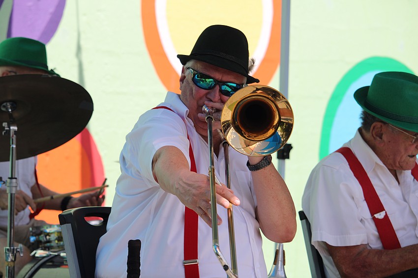 Dave DeWitt, trombonist for The Fabulous Schnitzel Brothers band, entertained Oktoberfest attendees of all ages.
