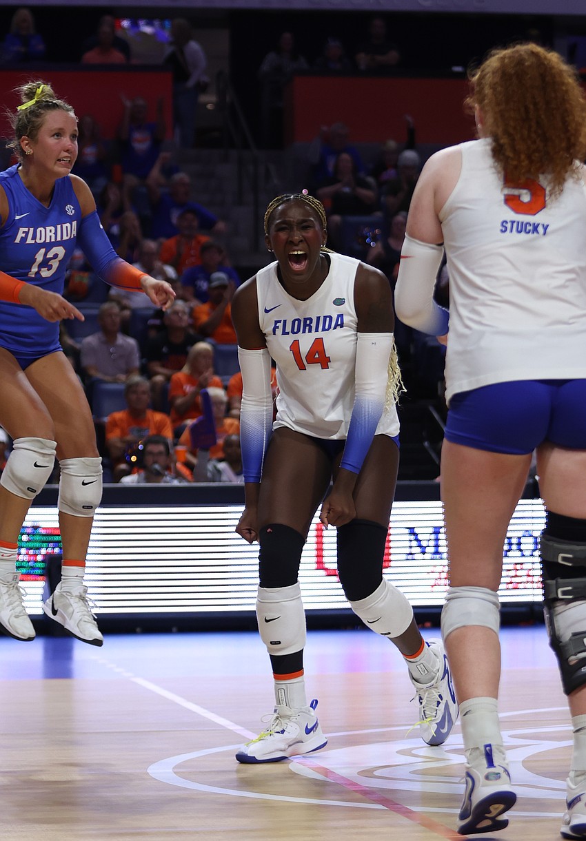 Byrd (14) gives a triumphant cry after winning a point during a Sept. 26 match against Mississippi State at Exactech Arena in Gainesville.