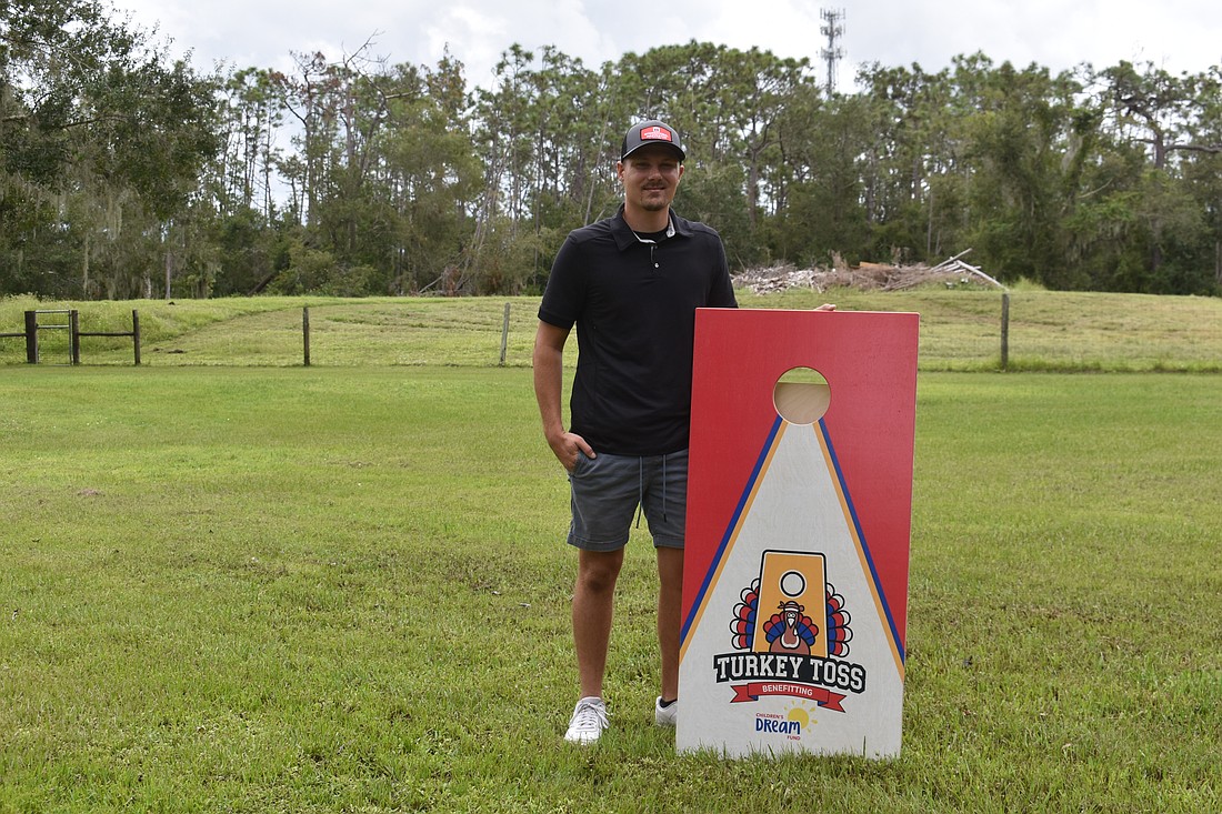 Matt Baar is hosting the first annual Turkey Toss cornhole tournament in his Myakka City backyard Nov. 22 to benefit the Children's Dream Fund.