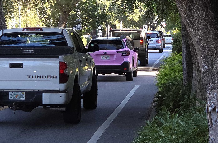 Morning commuters take Osprey Avenue in Laurel Park into downtown Sarasota.