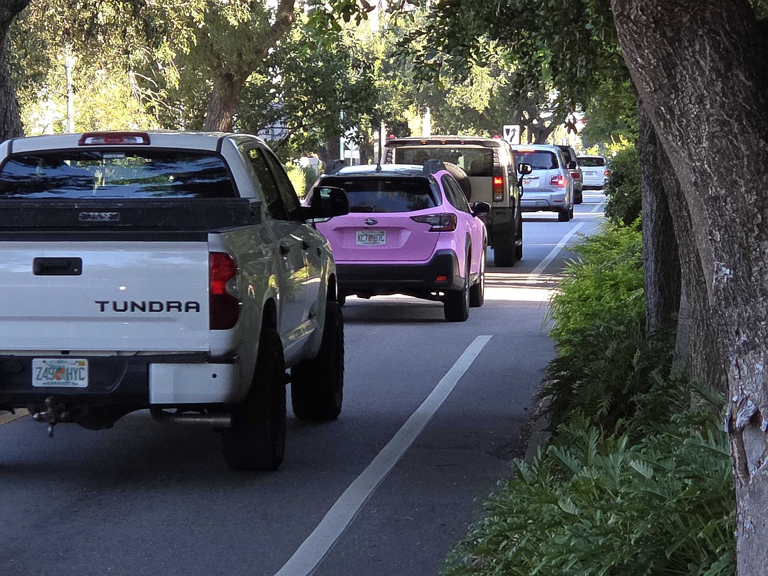 Morning commuters take Osprey Avenue in Laurel Park into downtown Sarasota.