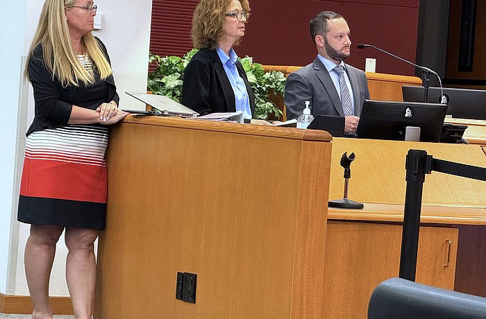 From left, Sarasota Parks, Recreation and Natural Resources Director Nicole Rissler, Hermitage Board of Trustees President Carole Crosby and Hermitage attorney Steven Solowsky address the county commission.