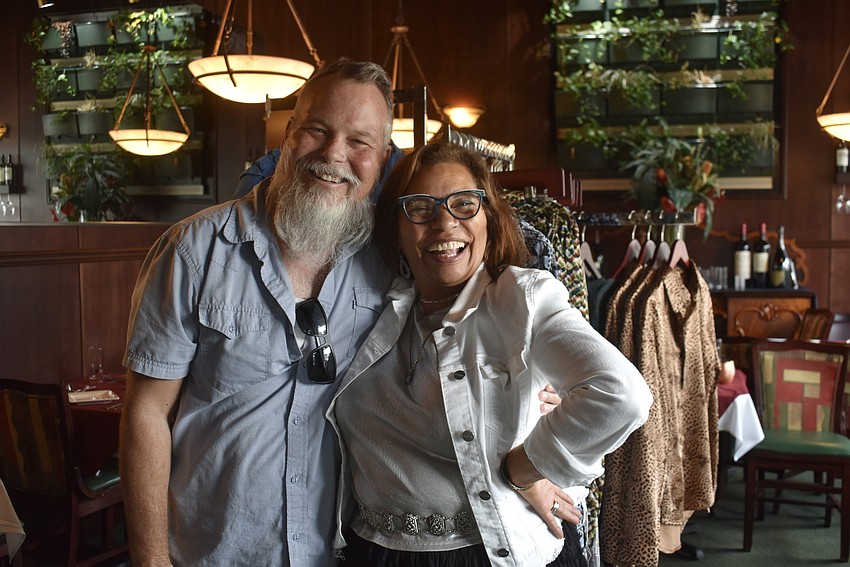 Hans Wohlgefahrt, director of outreach and communications for Donte's Den, and shop owner Nikki Pelier-Simon celebrate a successful event.