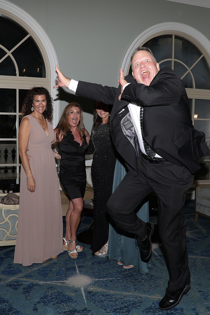 Doug Duncan photobombs Sandy King, Chantel Rayfinch, Janelle Duncan and Sarah Garfin.
