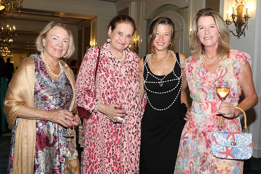 Corrine Wagner, Flora Major, Grace Moore and Elizabeth Moore attend Pearls & Prosecco on Oct. 10.