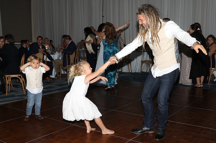 Deveraux Forrester covers his ears as sister Solaris dances with their dad, Buca.