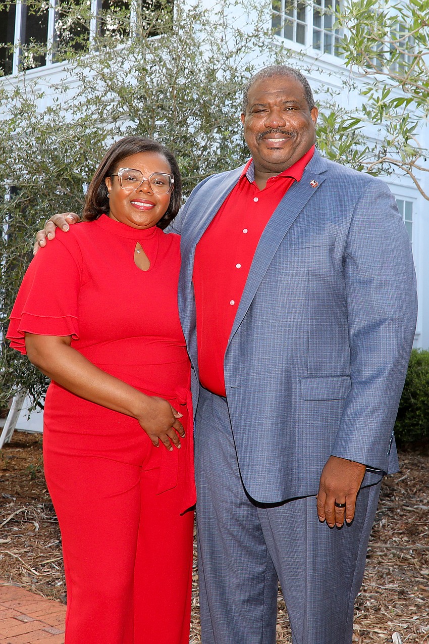 LaDina and Omar Evans arrive.