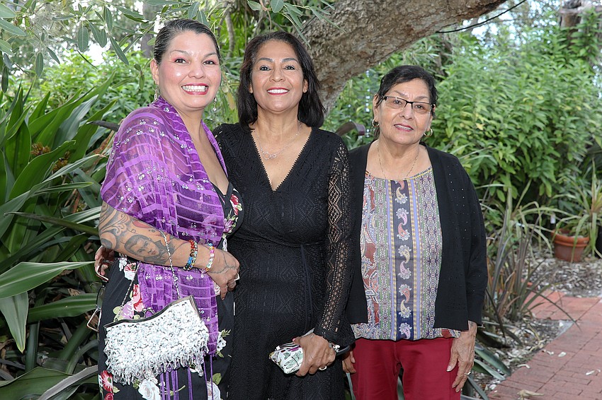 Jessica, Annette and Connie Martinez arrive at Marie Selby Botanical Gardens for the Taste of New Orleans event held on Oct. 11.