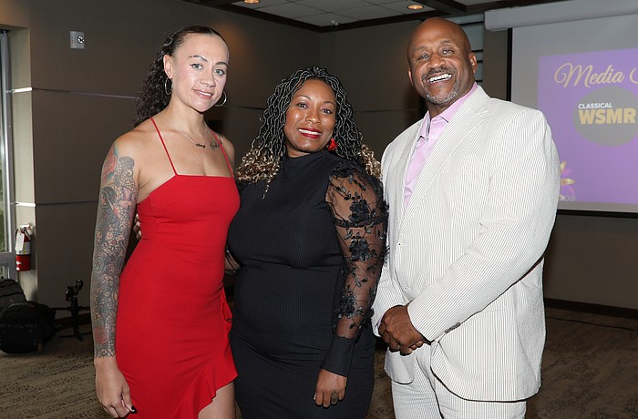 Amy Holmes, Truly Valued CEO and founder Shavonne Johnson and Charles Whitfield