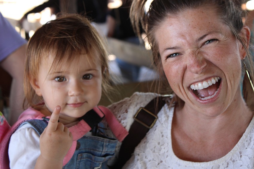 Sarasota's Leah and Courtney Theriault are having a ball at the Dakin Harvest Festival Oct. 12 in Myakka.