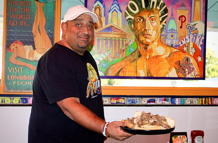 Robin Gupta, owner of Guppy's Longboat Key, said he's most proud of the way the restaurant has brought together people over lively conversation and hot cheesesteaks in its first year of operation.