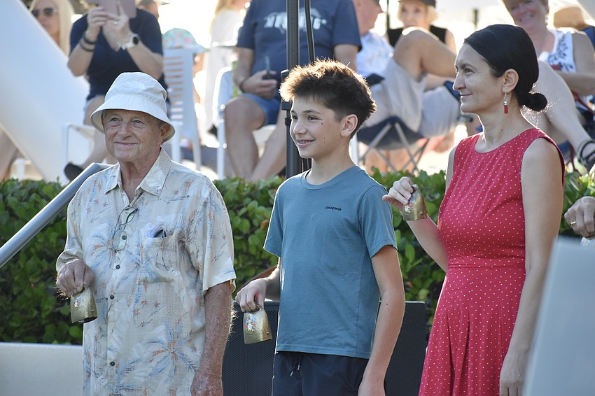 Attendees Pete Demichele, Paulie Burmeister and Suzana Culi play 