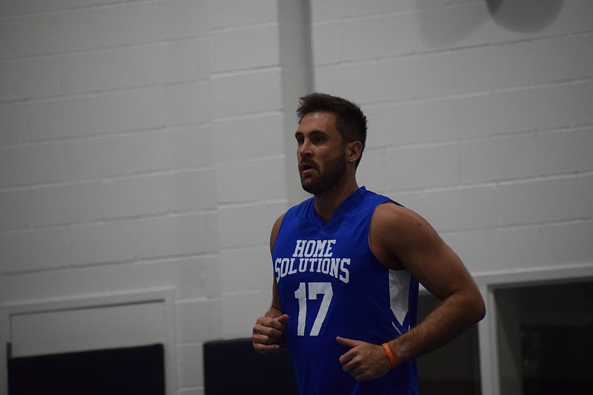 Wilcox jogs down the court during the Oct. 6 contest between Kari's Face Painting and Bretz Chiro.