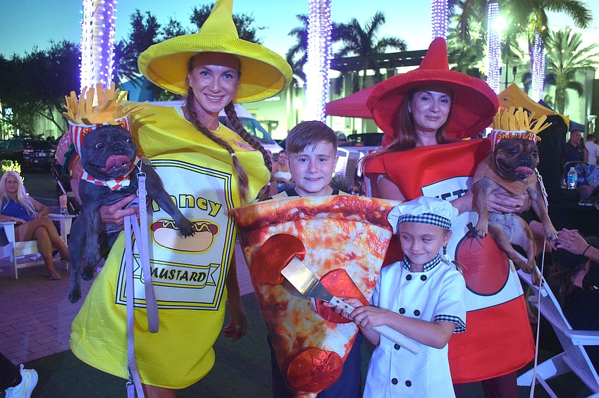 Dressed as different food items and a chef are Angelica Kevra, William Warren, Stefania Warren and Leah Kevra.