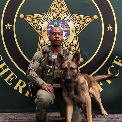 Flagler County Sheriff's Office Master Deputy Marcus Dawson with his K-9 partner, Kyro. Courtesy photo