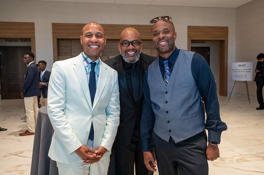 Brandon Johnson, President of the Sarasota County Branch NAACP Trevor Harvey and Greg Rumph