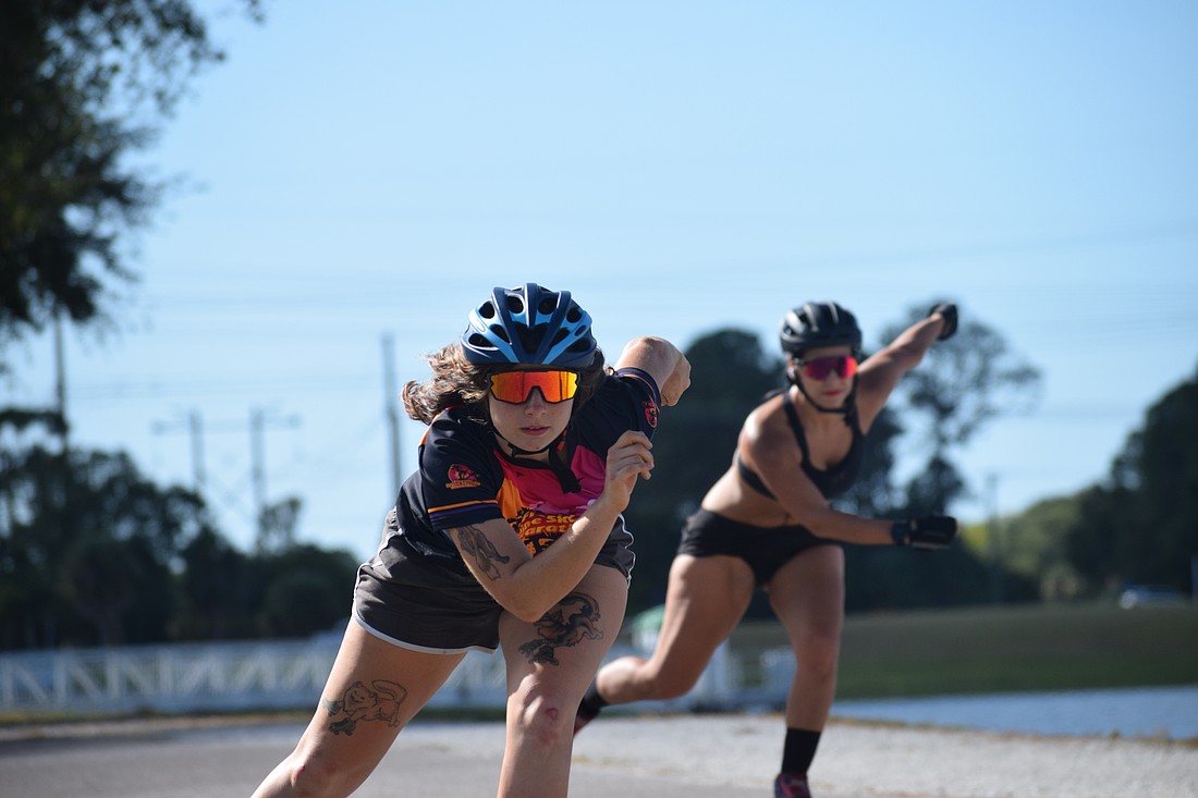 Brooke Pavek (left) and Xochitl Napoles (right) skate down the path at Nathan Benderson Park on Oct. 18. Both will be active in this year's marathon.