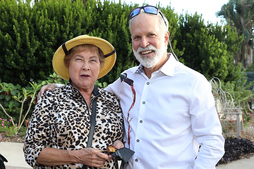 Pat Brennan and Dave Murphy enjoy a cocktail reception at Safari Sarasota.