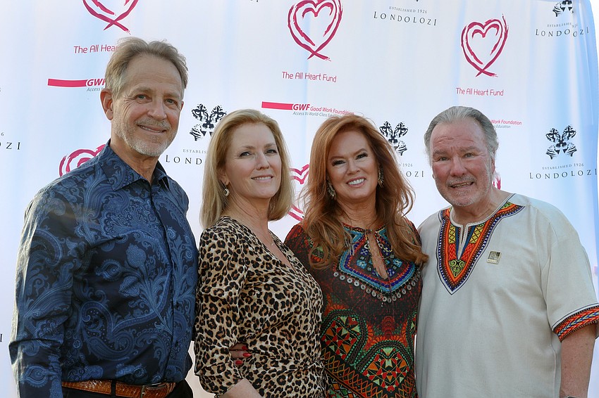 Steve and Beth Knopik with Terri Shea-Klauber and Michael Klauber welcome 150 guests to Safari Sarasota.