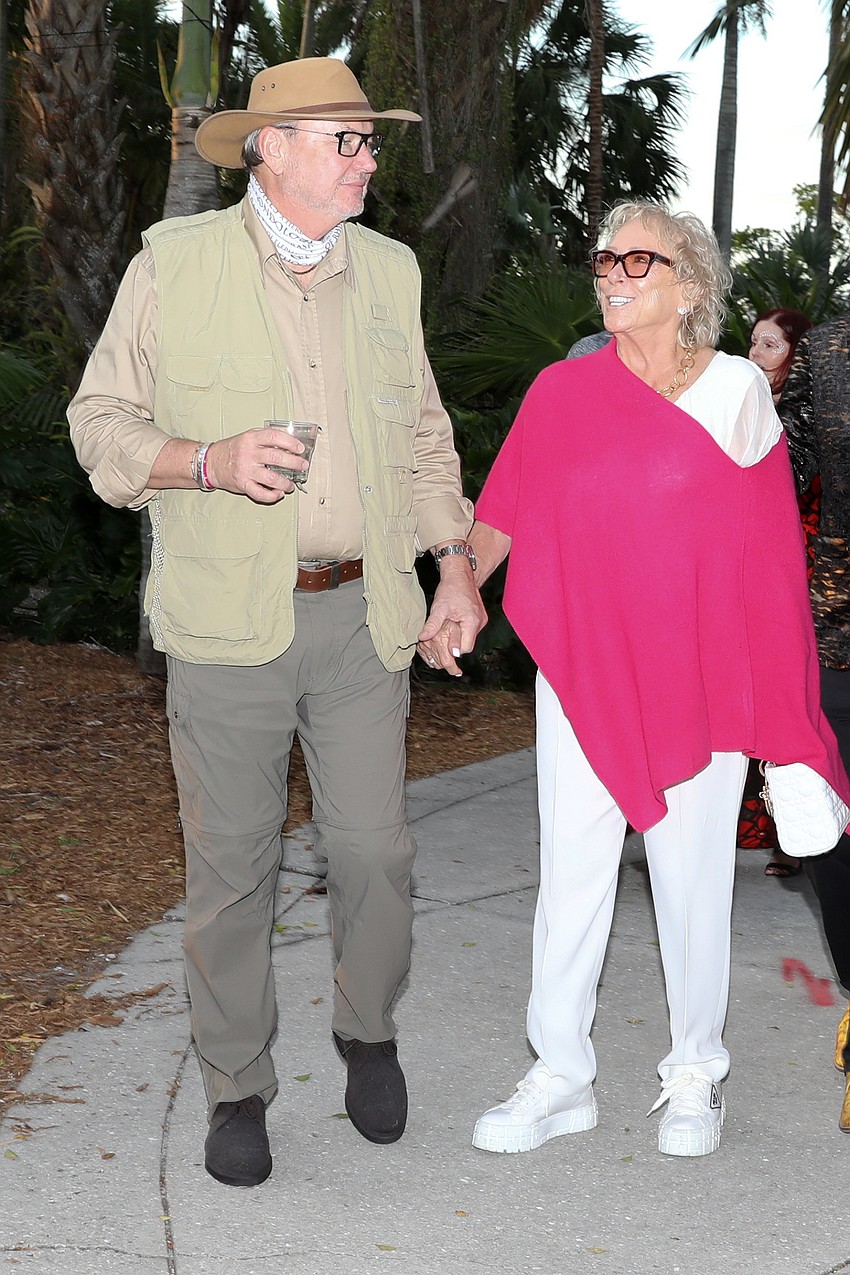 Tom Koski is dressed for the bush as he escorts his wife, Sherry, into Safari Sarasota.