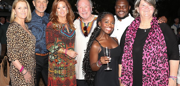 Beth and Steve Knopik from the All Heart Fund, Terri Shea-Klauber and Michael Klauber from Safari Sarasota and Maya Groch, Fumani Mathumbu and Kate Groch with the Good Work Foundation.