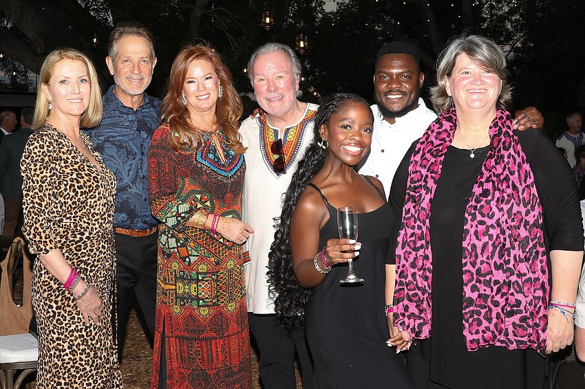 Beth and Steve Knopik from the All Heart Fund, Terri Shea-Klauber and Michael Klauber from Safari Sarasota and Maya Groch, Fumani Mathumbu and Kate Groch with the Good Work Foundation.