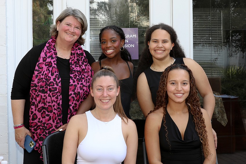 Morgan Steffers, Emily Smalley, Kate Groch, Maya Groch and Nevaeh Crews check guests in at Safari Sarasota 2025.