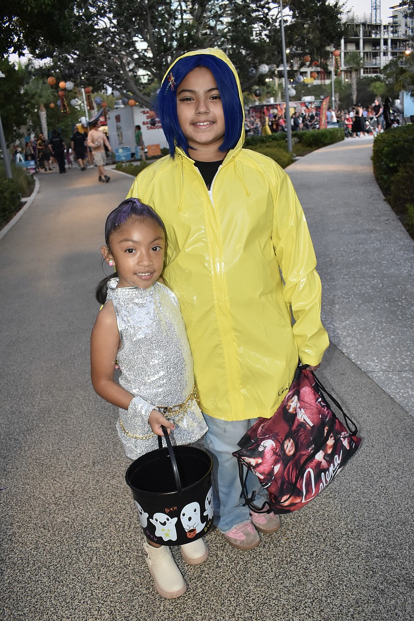 Avalyn Chavez, 4, and her sister Alexis Perez, 9, wore costumes from 