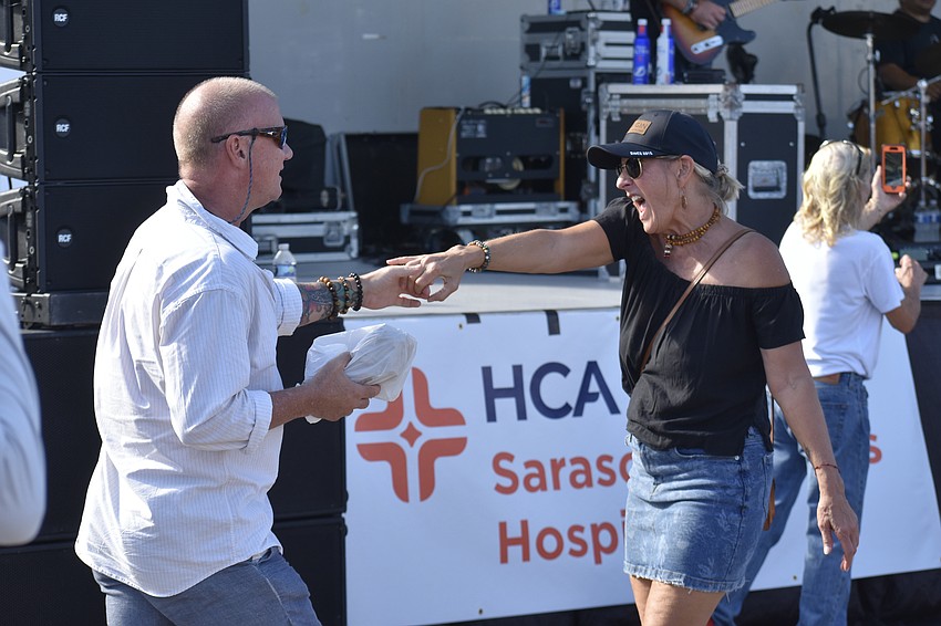 Andrew Foskui dances with his friend Leanne Moody.