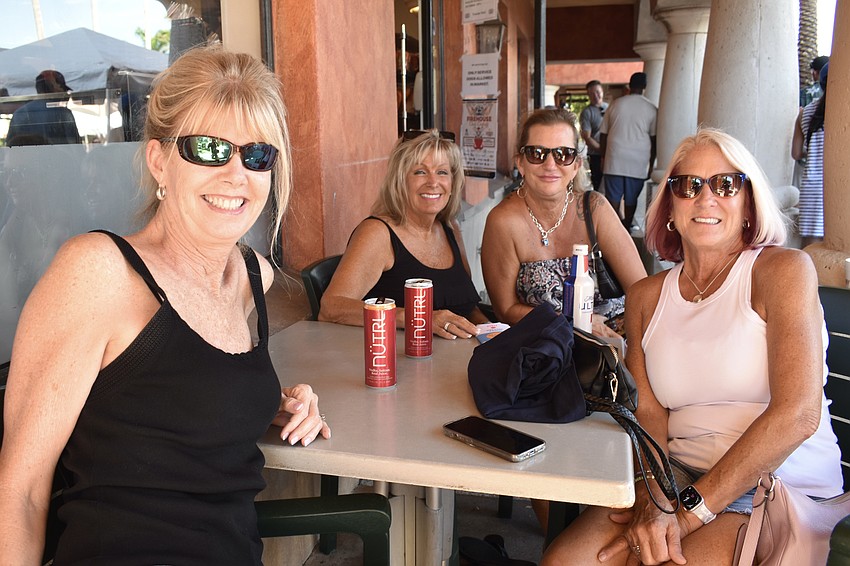 Sue Stephenson, her sister Ruthie Stephenson, Cathy Dahlbert, and Sue Stephenson's sister-in-law Kim Stephenson enjoy the event together.